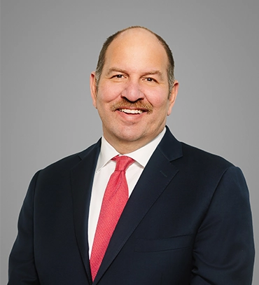 Headshot of SHAZAM Executive Vice President, Government and Community Affairs Dan Kramer